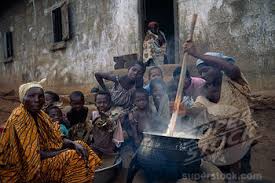 women cooking nshima